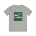 Gray t-shirt with green and white text on a white background