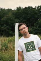 Out of Bounds Club Tee - Crossed Stakes Heraldic Mark